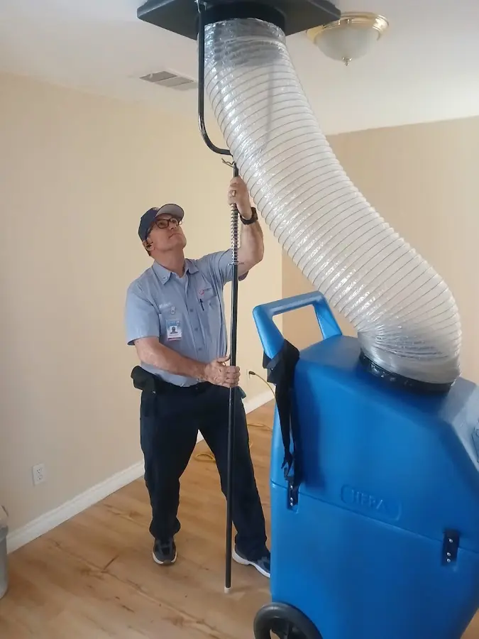 Mini Split Installation technician using HEPA equipment in San Luis